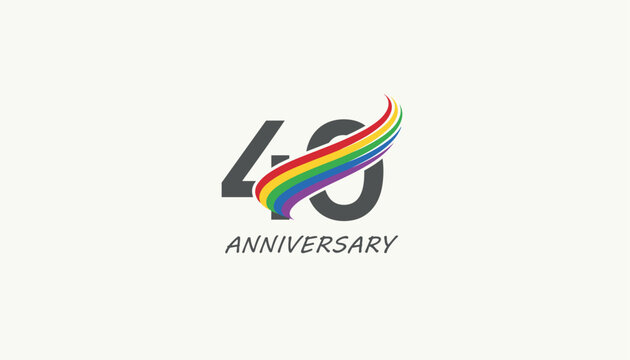 Celebrating 40 years of pride and progress with a colorful rainbow wave wrapping around the dark gray numbers on a light background.