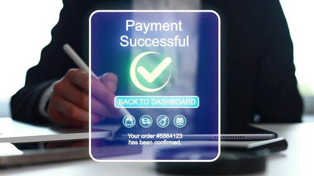 A person uses a tablet and checks their transaction. The screen shows a payment successful message with details about the order. It takes place indoors at a workspace.