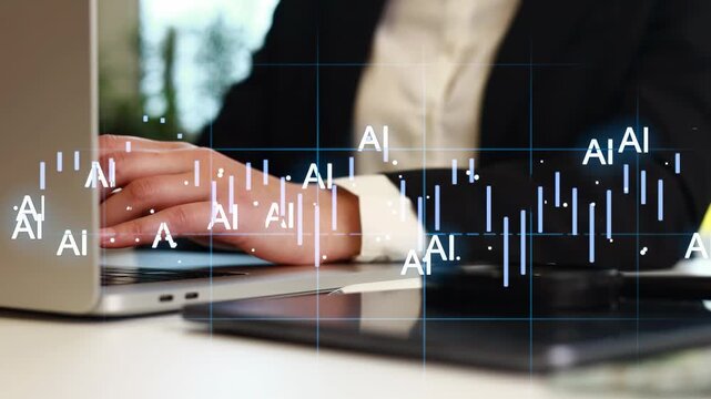 A person is typing on a laptop. Data visualizations related to artificial intelligence are visible on the screen. The setting is an office during daytime.
