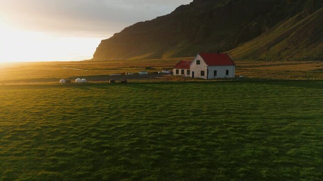 Aerial Close-Up of Icelandic Farmhouse in Golden Light