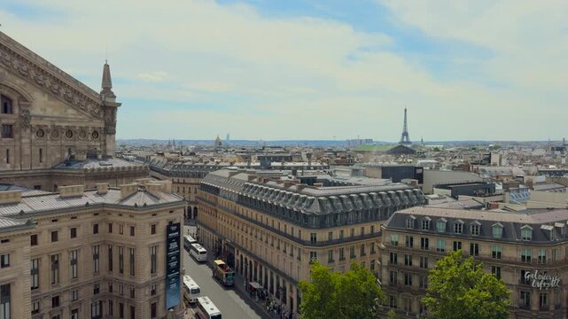 Panoramic aerial view of the paris skyline. Beautiful city rooftops featuring the palais garnier opera house and the eiffel tower.
