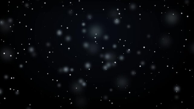 Abstract snowfall particle overlay drifting softly on a dark black background, featuring glowing white bokeh light specs creating a magical winter atmosphere for video background design.