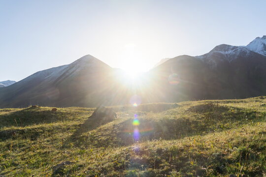 Sunrise over Achik-Tash valley near Lenin Peak base camp in summer