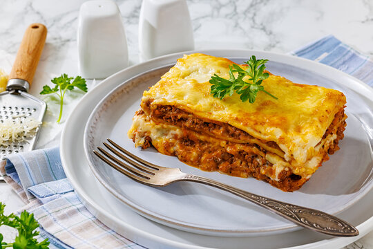 Meat lasagna portion with minced beef, cheese
