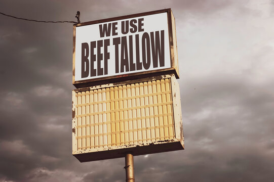 Aged and worn beef tallow sign