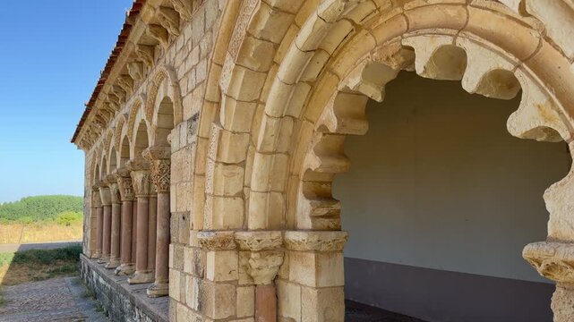 Ornate romanesque arch of a medieval church in spain
