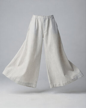 Floating Wide-Leg Linen Trousers on Gray Background