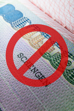 Entry ban, visa cancellation, visa ban, visa crossed out in red Schengen visa for Europe, travel within the Schengen area. EU visa for Spain, tour, airport, customs, news, closed borders, nationality.