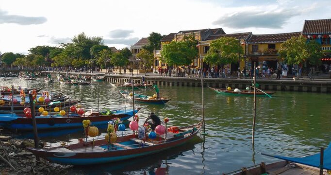 Time lapse of timelapse of Hoian Old town in Hoi An city, Da Nang province, Vietnam. Panoramic riverside of Ancient town, UNESCO world heritage. One of the most travel popular touristic destinations 