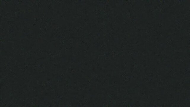 Dark textured background with subtle grainy pattern