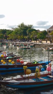 Time lapse of timelapse of Hoian Old town in Hoi An city, Da Nang province, Vietnam. Panoramic riverside of Ancient town, UNESCO world heritage. One of the most travel popular touristic destinations 
