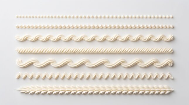 White buttercream frosting borders, decorative whipped cream piping set, sweet vanilla icing swirls for cake design isolated PNG with Transparent Background