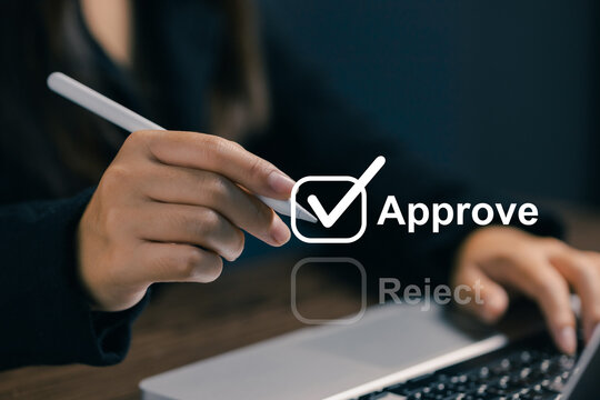 Businesswoman using digital stylus to select an approve checkbox on virtual interface, illustrating online authorization, document validation, decisions and business workflow management.