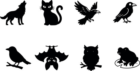 Naklejka premium Set of black silhouettes featuring various animals including a howling wolf cat raven bat owl and a small frog