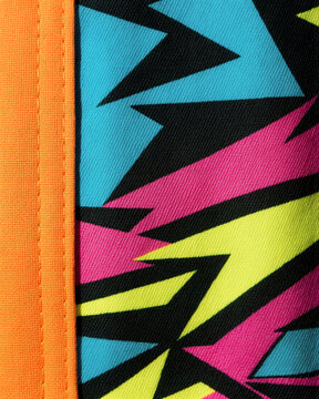 Neon Geometric Lightning Print Fabric with Orange Trim Detail