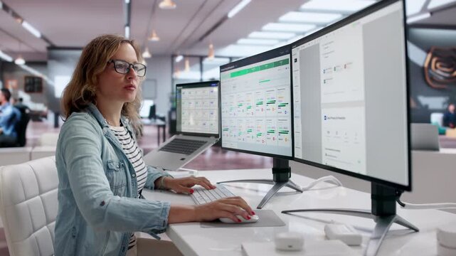 Contract Manager Reviewing Agreement Lifecycle Using Laptop For Compliance