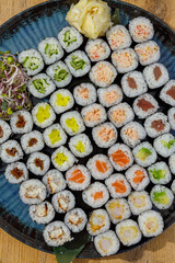 Overhead view of a large platter of assorted sushi maki rolls © Cavan