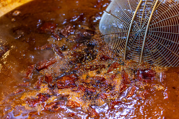 Obraz premium Braised Street Food Simmering in Spiced Broth