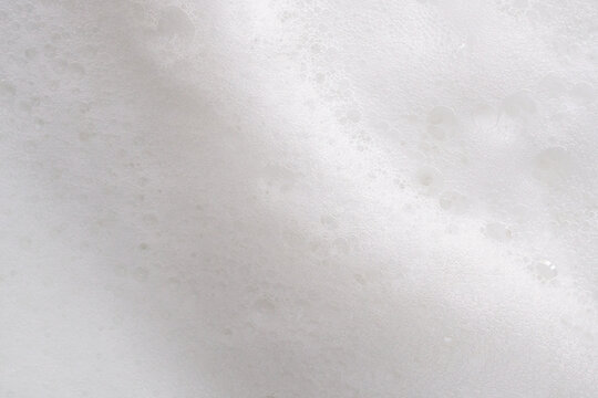 Closeup abstract white soap foam bubbles texture background