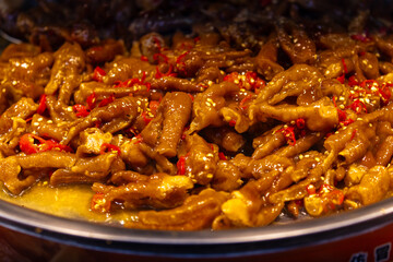 Obraz premium Braised Street Food Simmering in Spiced Broth