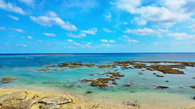 Rocky Shores And Coastal Waters Viewed From Hamabe no Chaya Near Mibaru Beach In Nanjo, Okinawa, Japan. Wide Shot