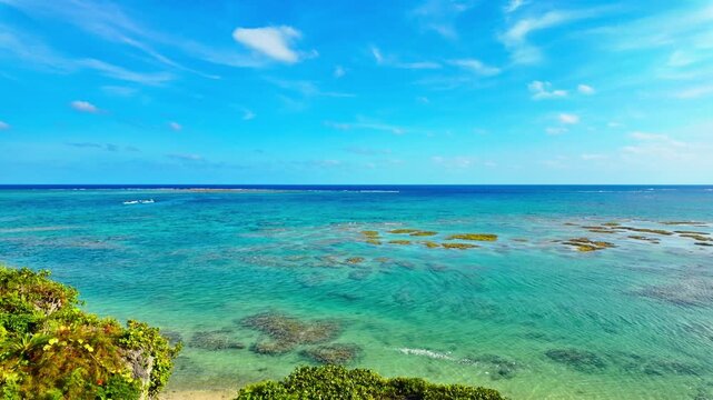 Overlooking Shallow Coral Reef Formations From Hamabe no Chaya Near Mibaru Beach In Nanjo, Okinawa, Japan. Aerial Wide Shot