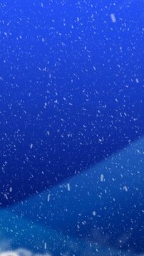 Animation of winter scenery with snow falling on blue background