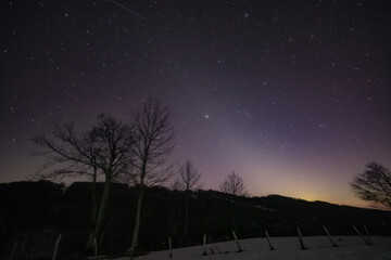 Orion constellation, zodiacal light and Milky Way stars on a dark countryside skies. © astrosystem