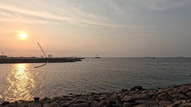 Cove at Batavia PIK offers a scenic waterfront atmosphere at sunset in Jakarta, with warm evening light reflecting across the areas modern architecture and coastal surroundings