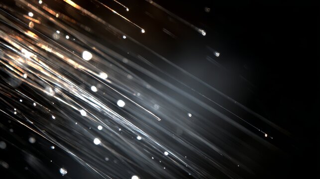5.Rain falling like glowing silver threads against a black background, diffused light illuminating each line, reflective droplets twinkling gently, whisper-soft motion, peaceful nighttime feeling,