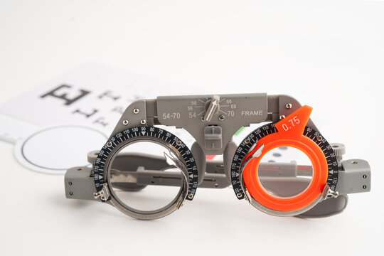 Ophthalmic trial frames to visual acuity eye test.