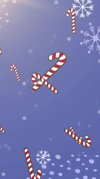 Animation of falling snowflakes an candy cane on blue background