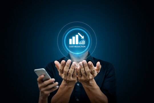 Businessman holding a digital cost reduction hologram icon for corporate financial planning strategy