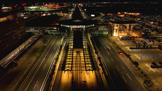 Timelapse of Athens Airport Passenger Bridge and Highway Traffic at Night Greece 