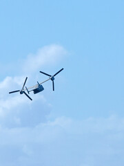 Fototapeta premium Military Tiltrotor Aircraft Flying in Blue Sky at Gold Coast Airshow