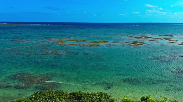 Coral Reef Formations View From Hamabe no Chaya Near Mibaru Beach In Nanjo, Okinawa, Japan. Aerial Panning Shot