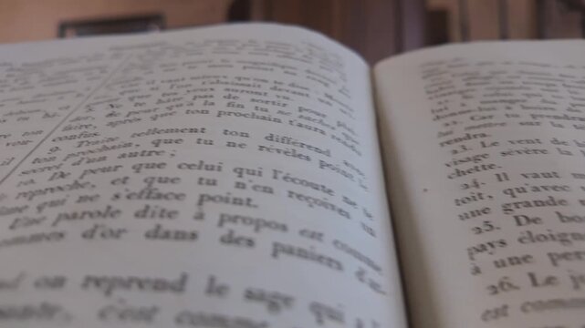 Cinematic Slow Pan Across the Pages of an Antique French Bible, Book of Proverbs