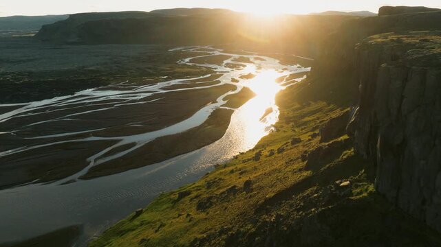 Drone Flight Along a River Canyon With Sun Flare, Iceland