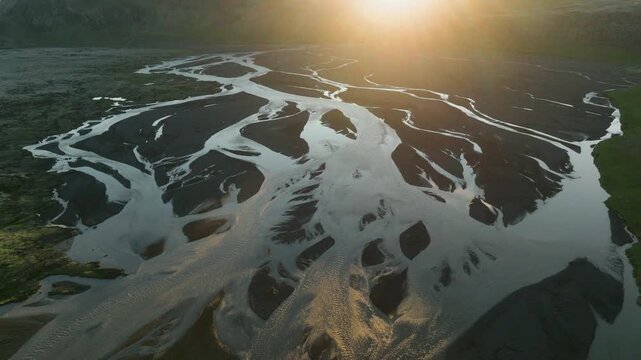 Braided River Delta Glowing in Sunlight, Aerial Iceland