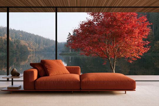 Minimalist autumn lakeside interior with low red chaise sofa and vibrant maple outside panoramic windows for seasonal wallpaper and background design