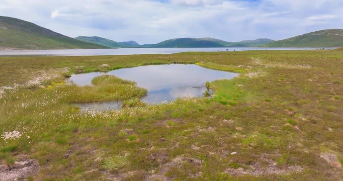4K video; Forward drone flight over a fjell (mountain plateau) with lakes in the mountains of southwestern Norway