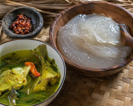 Traditional Papeda Sago Porridge with Yellow Fish Soup from Papua