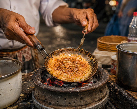 Traditional Jakarta Kerak Telor Cooked over a Charcoal Stove