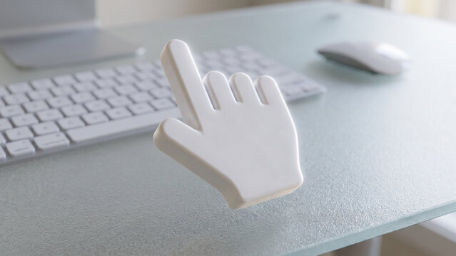 Three Dimensional Cursor Hand Symbol Resting Beside Modern Computer Workspace
