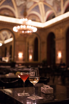 glasses of wine and cocktail in elegant restaurant
