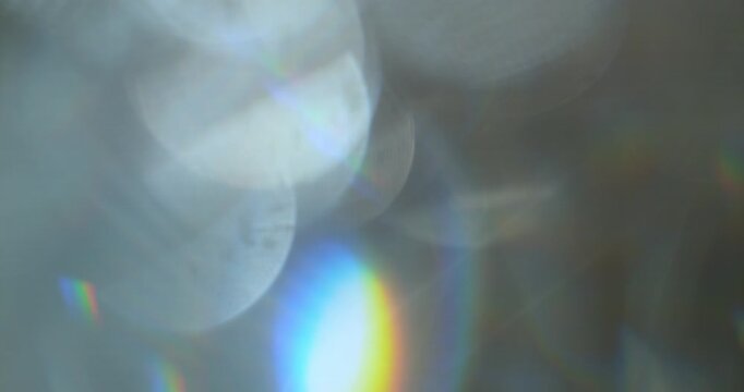 Slow motion cinematic lens flare and light leak effect isolated on black background. Perfect overlay for VFX, transitions, title reveals, film burn style and glow highlights.