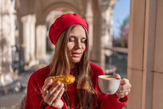Woman Beret Coffee: Girl enjoys dessert and coffee outdoors on sunny day for pleasure.