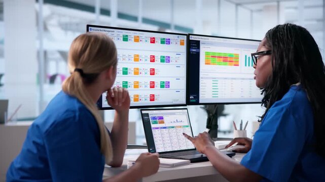Hospital Manager Reviews Patient Flow Dashboard