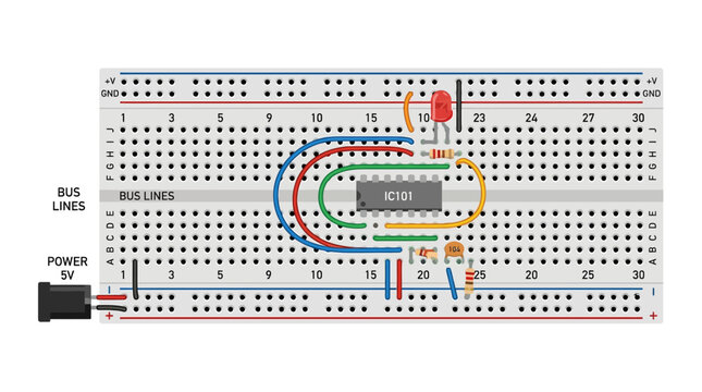 Electronic Circuit on Breadboard with LED and Integrated Circuit