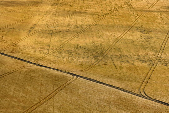 Road lines on a plowed field near the village of Shilovo, Tula region of Russia
